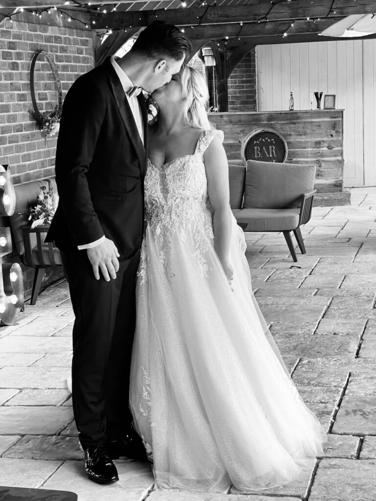 Bride and Groom Kissing at the Wickham Estate in Hampshire