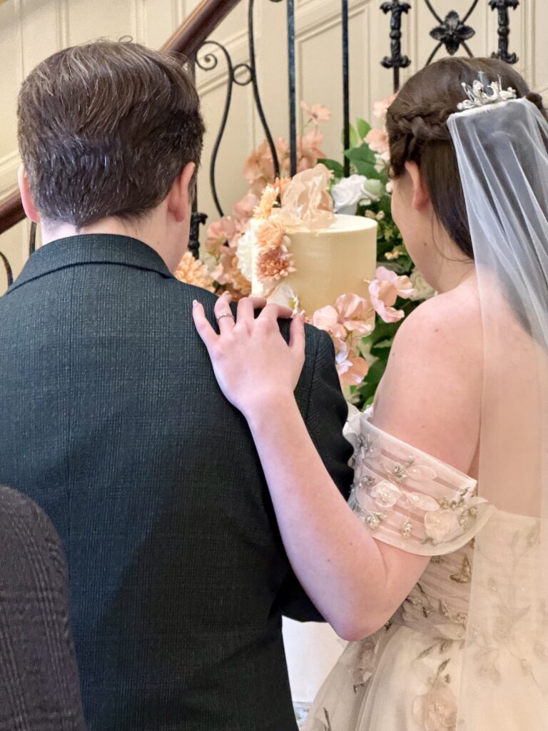 Bride and Groom Cutting the Cake
