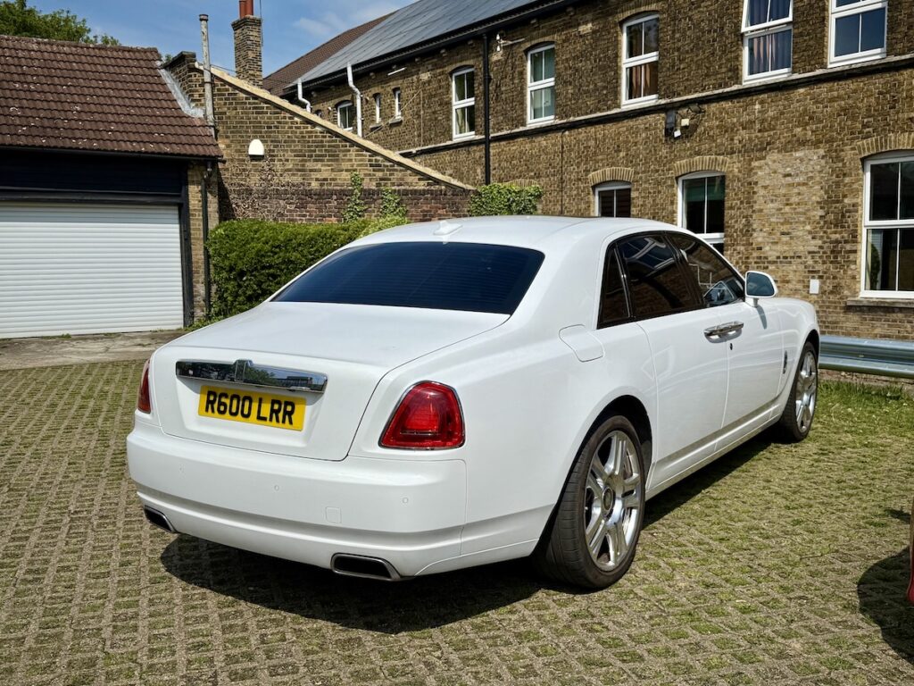 White Rolls Royce Wedding Car at St Thomas of canterbury church, Woodford Green, London