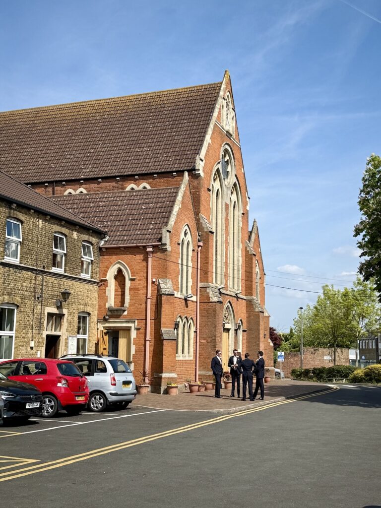 Exterior with Groomsmen at St Thomas of canterbury church, Woodford Green, London