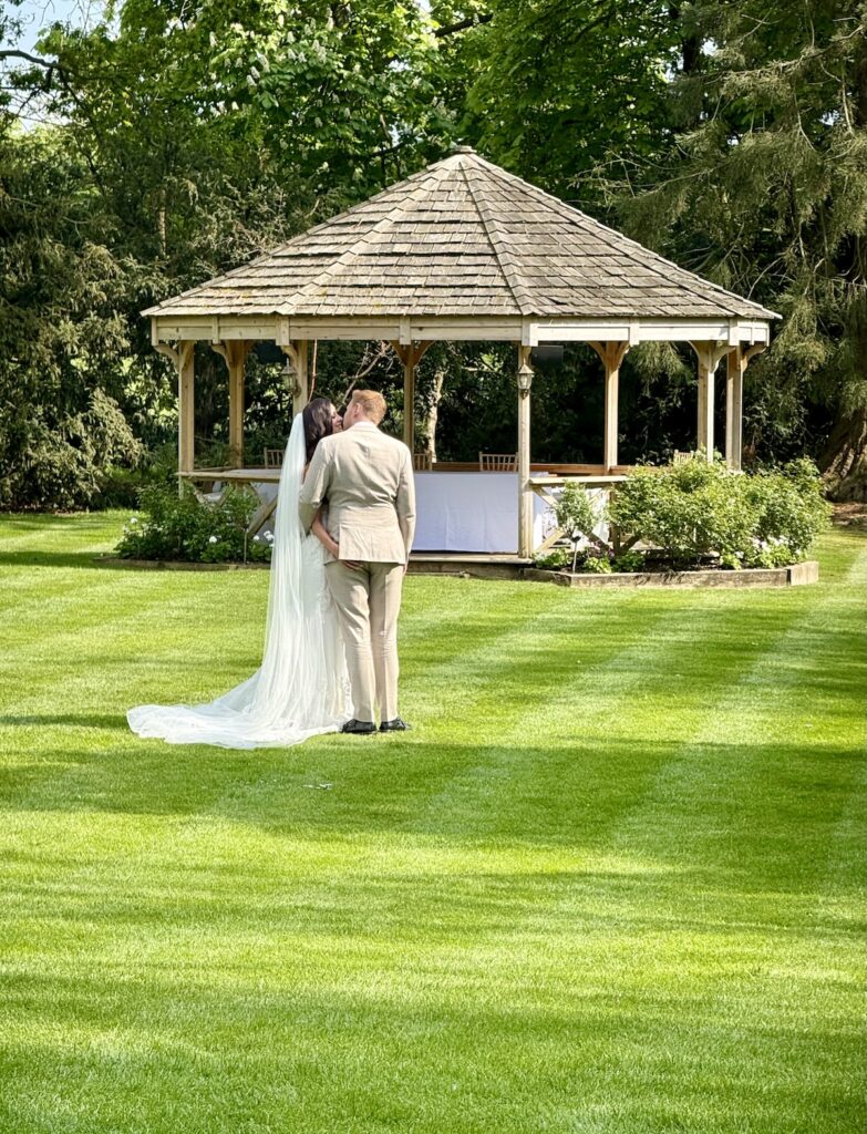 Wedding Couple at Mulberry House in Essex in the gardens