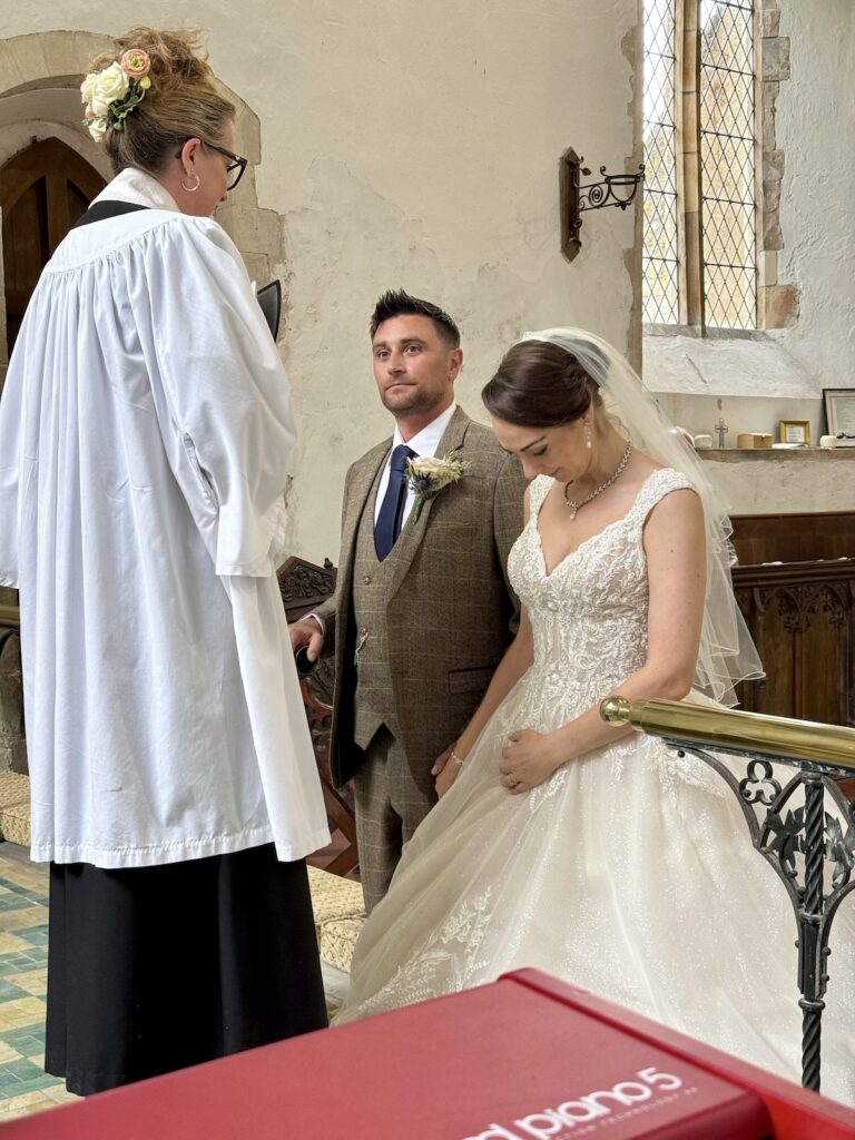 Bride and Groom with Vicar St Peter and St Paul
Mautby Norfolk