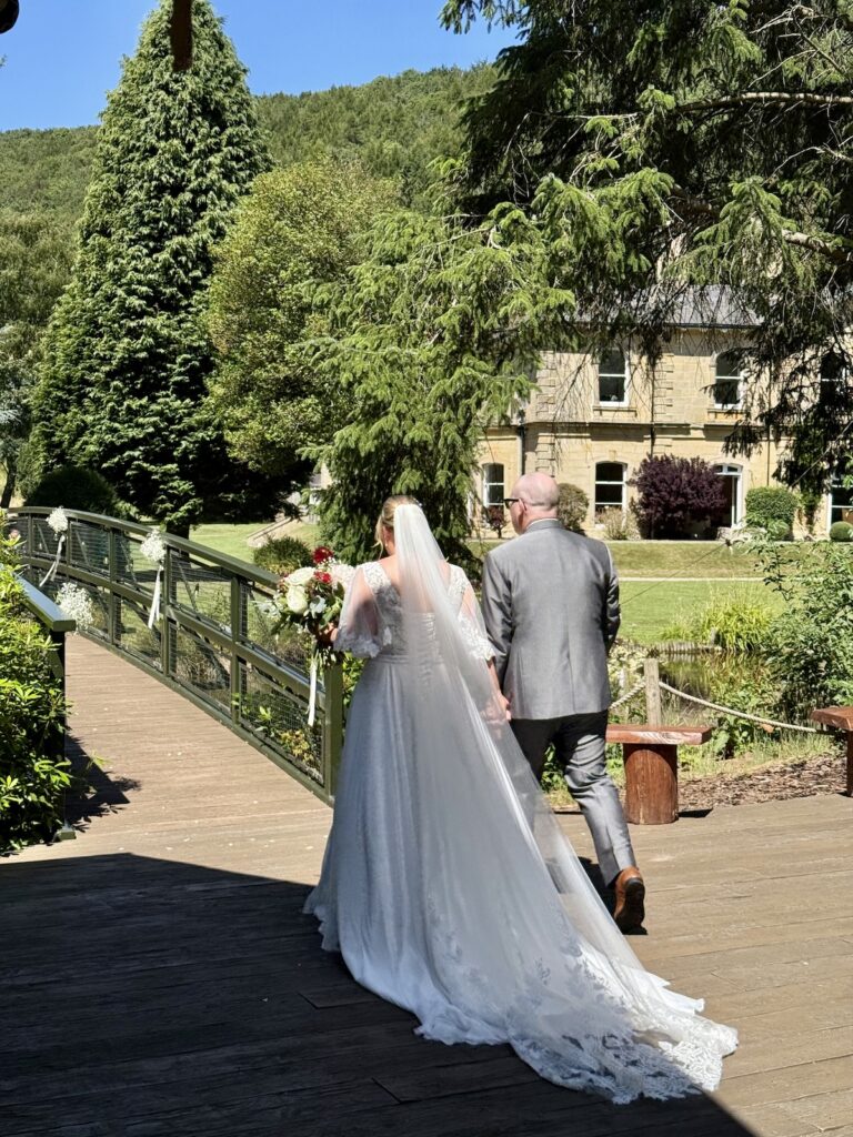 Bride and Groom off to confetti shot at Hackness Grange in Yorkshire