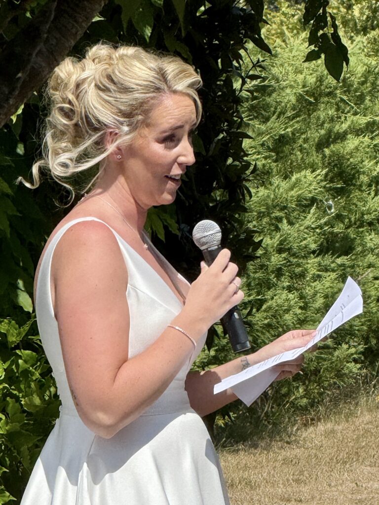 Bride saying her vows at High Billingshurst Farm in Surrey