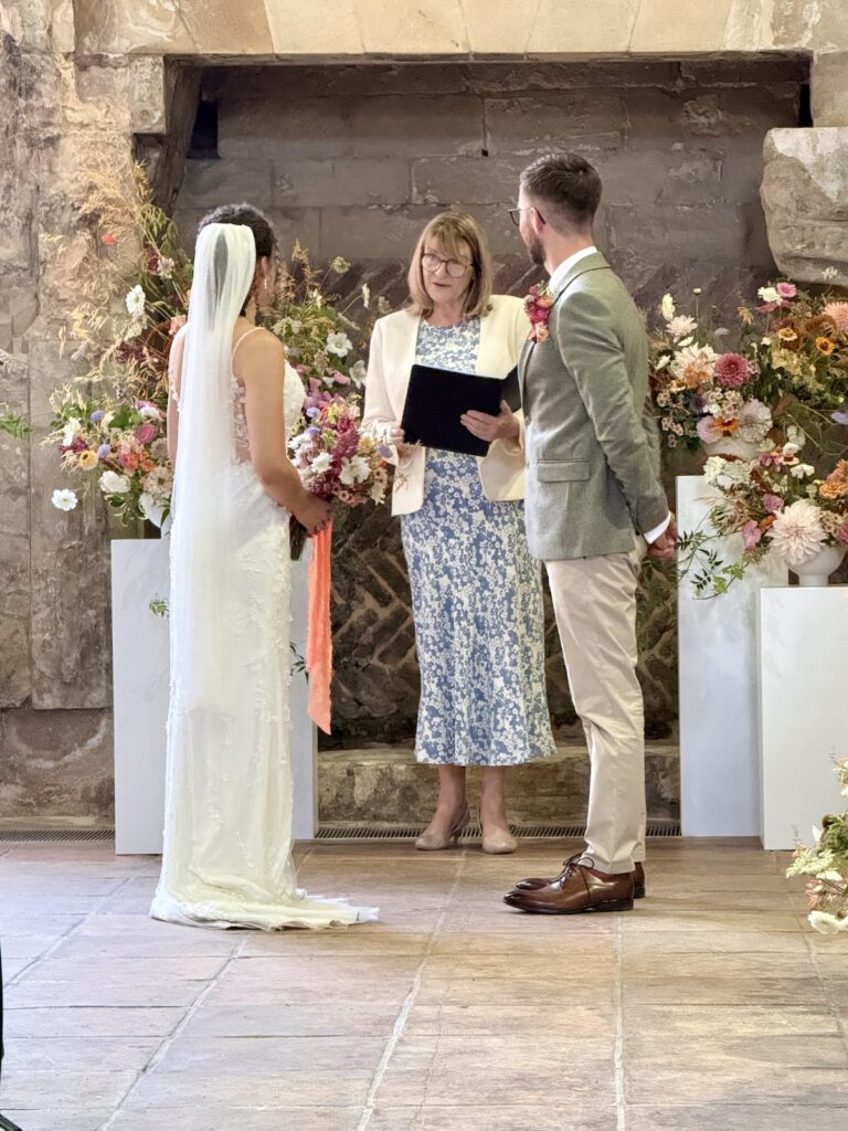 Wedding couple and registrar at Blackfriars Priory in Gloucester
