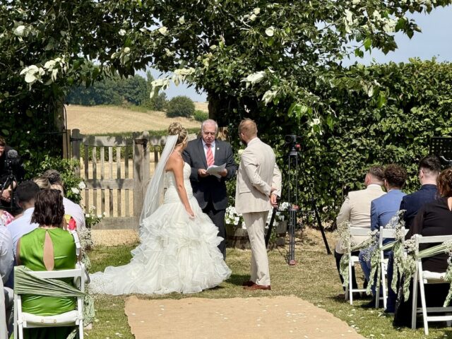 Bride and Groom outdoor ceremony at Charingworth Manor in the Cotswolds