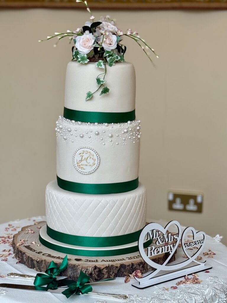 Wedding cake with green ribbons at The Lawn, Rochford in Essex