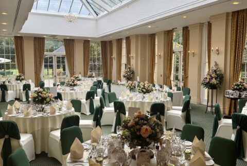 The meal room with a green theme at The Lawn, Rochford in Essex