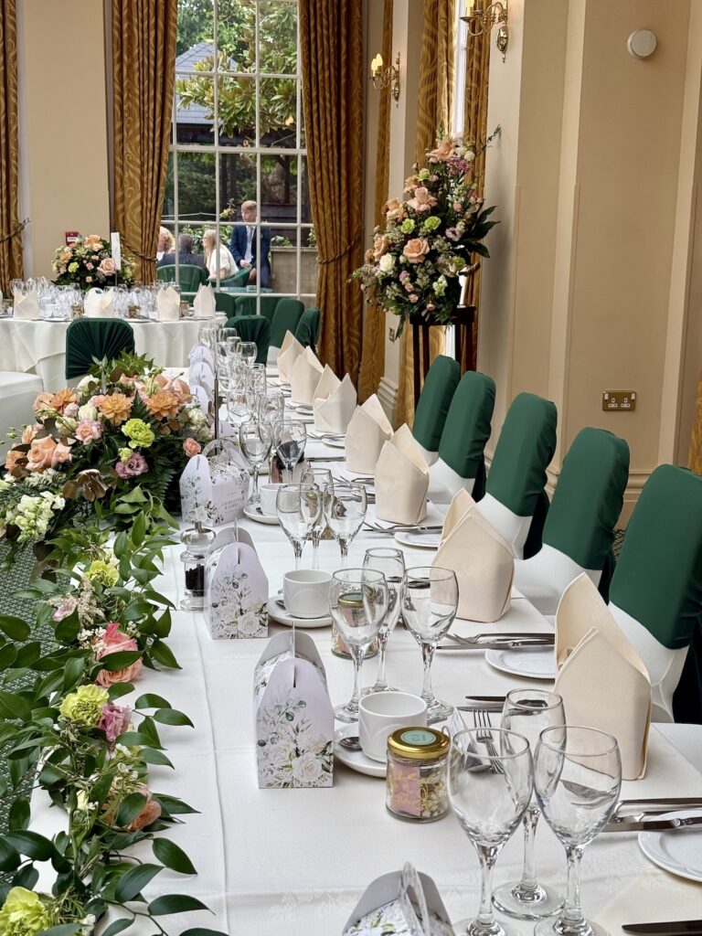 Top Table for wedding with green theme at The Lawn, Rochford in Essex