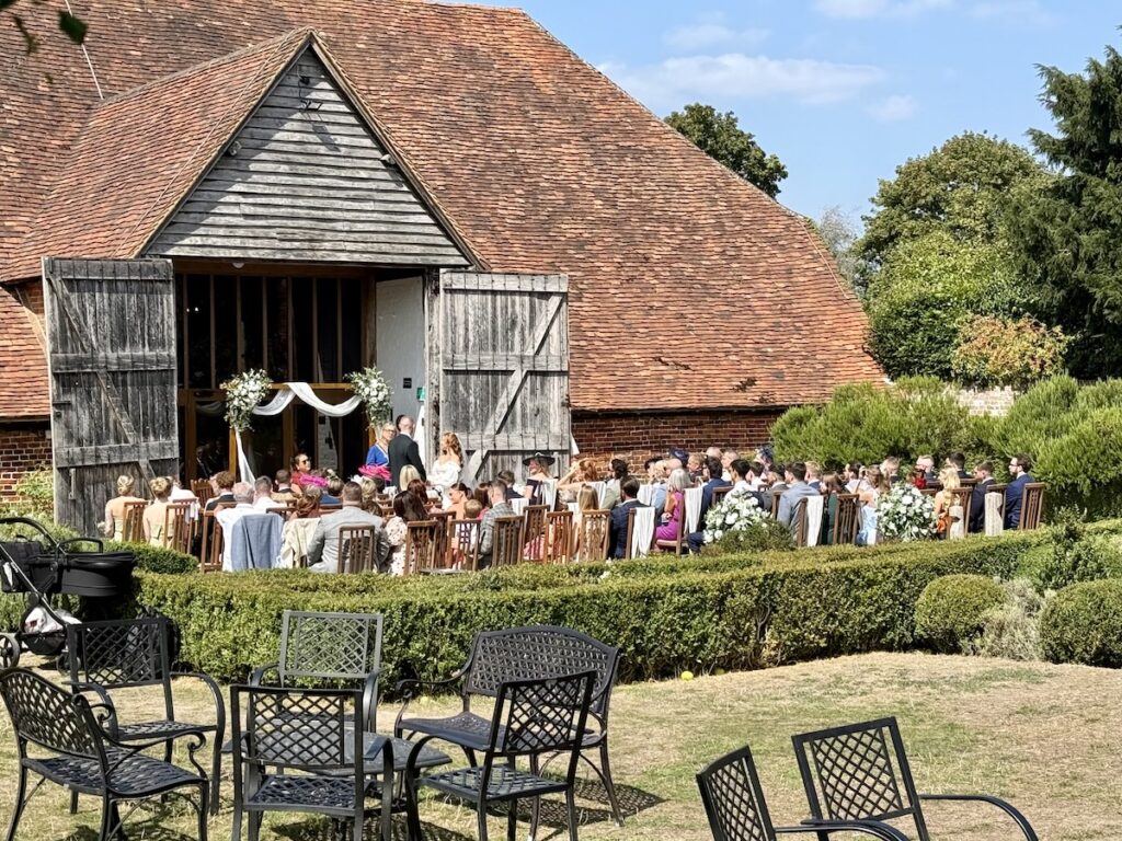Wedding ceremony outside at Ufton Court