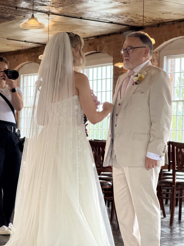 Bride and Father First Look at the West Mill Wedding Venue in Derby