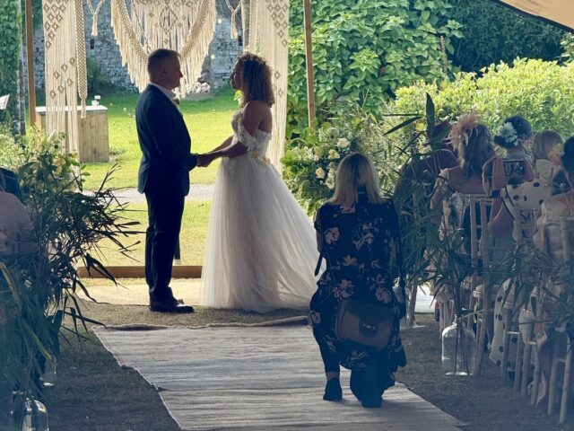 Wedding ceremony bride and groom outside at the Ash Barton Estate in North Devon