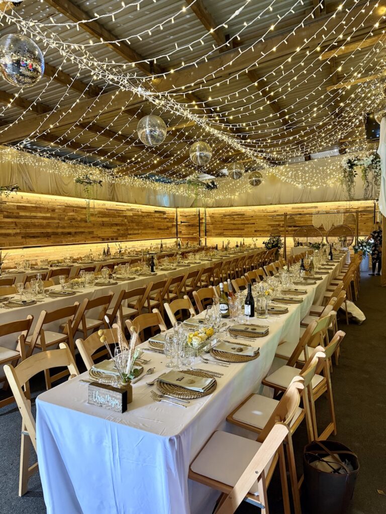 The Party Barn set up for a wedding meal at the Ash Barton Estate in North Devon