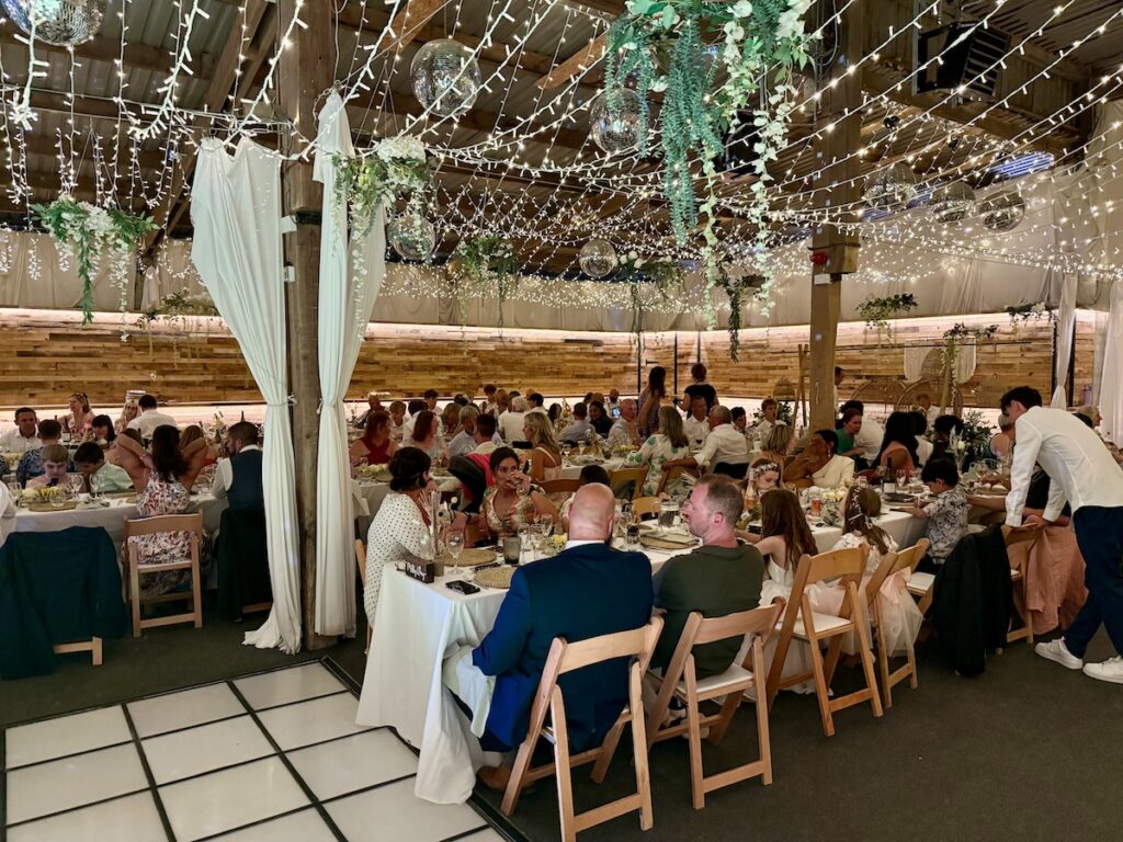 Wedding meal in the party barn at the Ash Barton Estate in North Devon