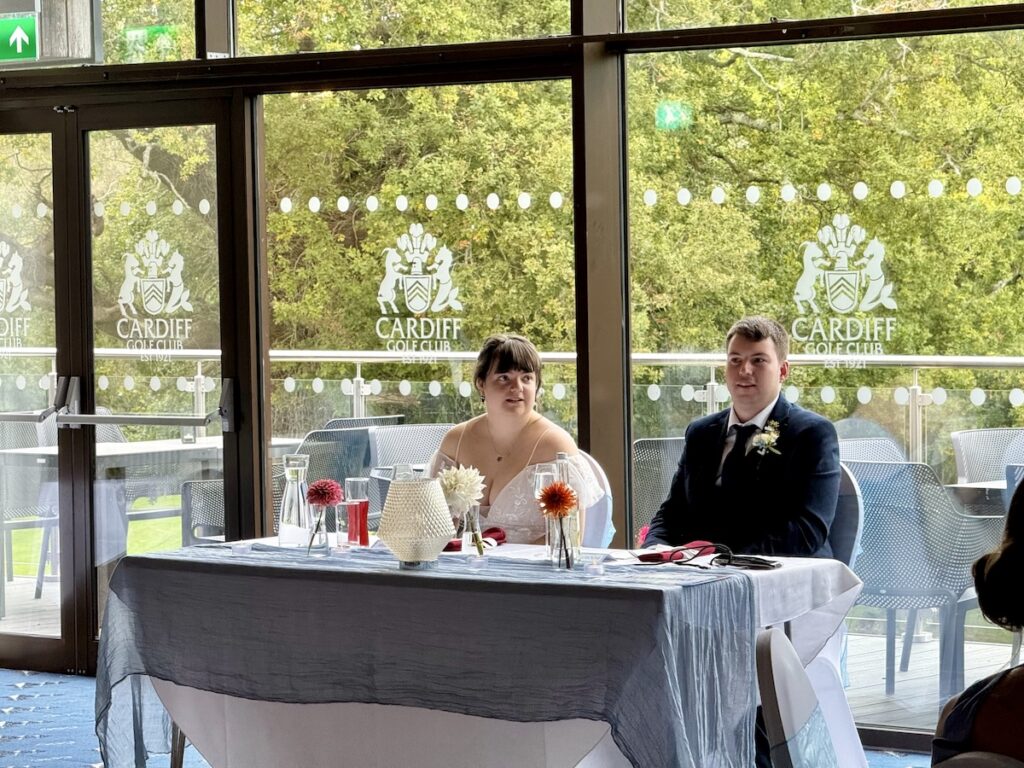 Bride and Groom at Sweetheart Table at Cardiff Golf Club in South Wales.