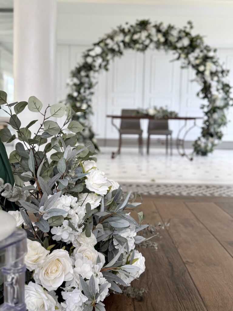 Flower arch for ceremony at Friern Manor in Essex