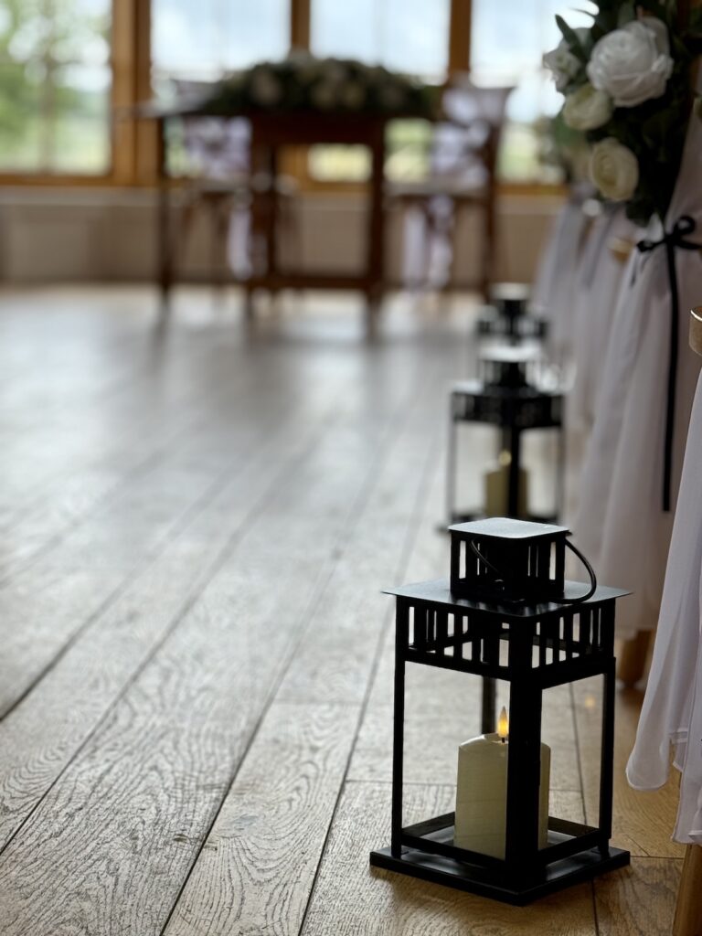Aisle candles at Hyde House in the Cotswolds
