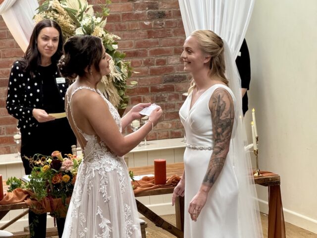 Two brides in the ceremony at the Pheasantry Brewery near Newark in Nottinghamshire.