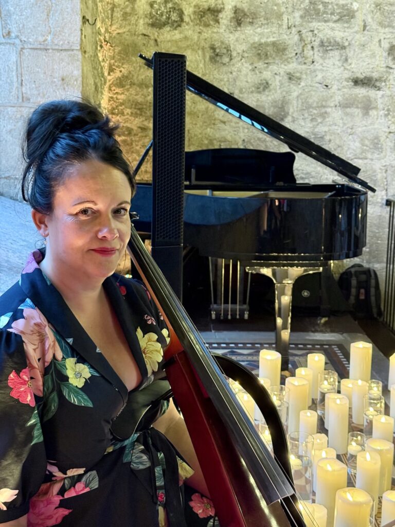 Wedding cellist with piano in background at the Priests House in Skipton