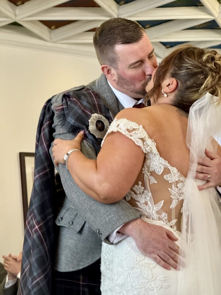 First kiss during ceremony at the Radisson Blu in Edinburgh