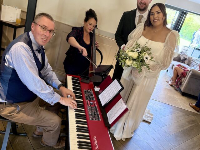 JAM Duo with bride and groom at Stretton Manor Barns