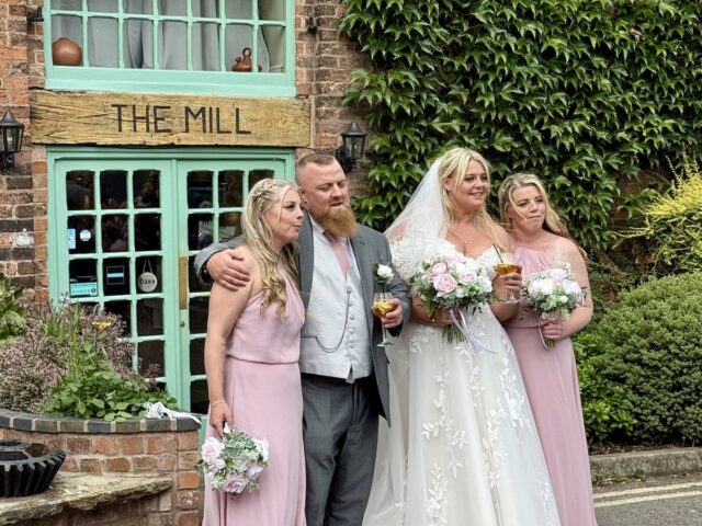 Bride and Groom outside at the Mill in Stone Staffordshire