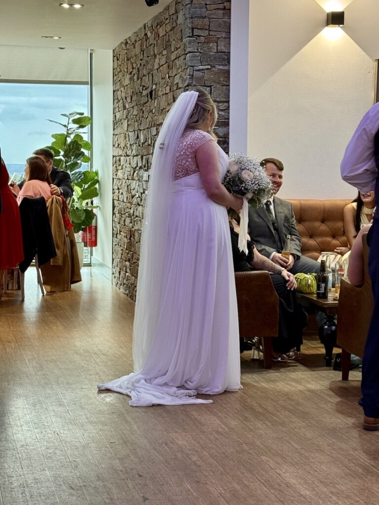 Bride in Drinks reception at The Vu in Bathgate Scotland