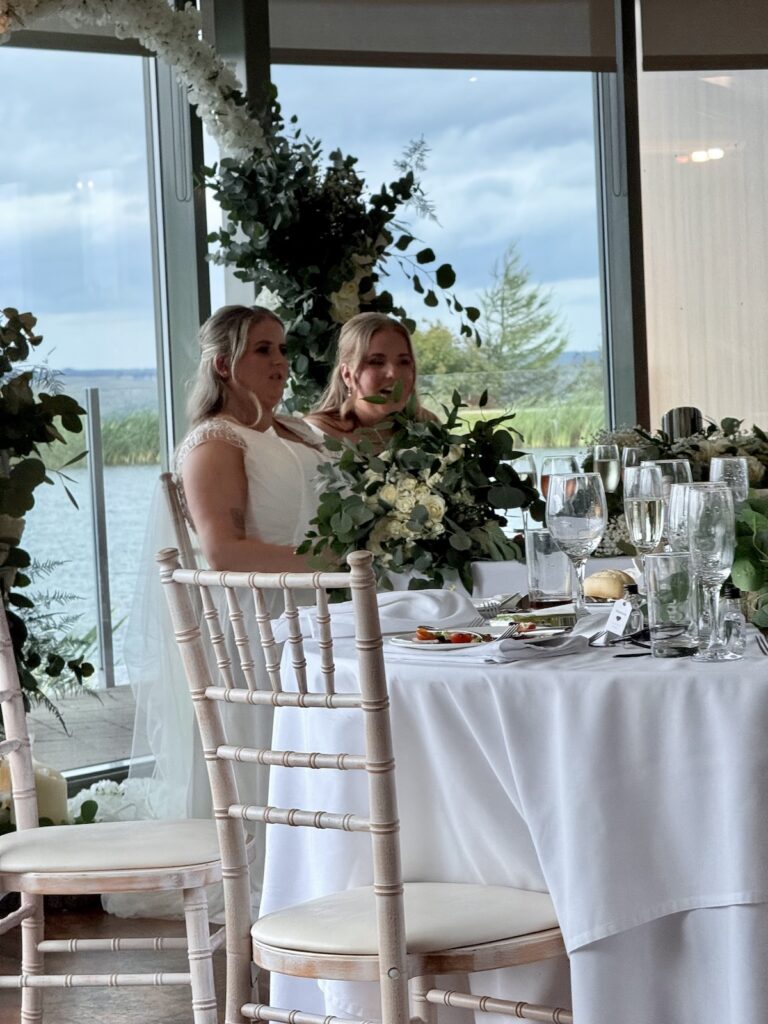 Two brides at wedding breakfast at The Vu in Bathgate Scotland