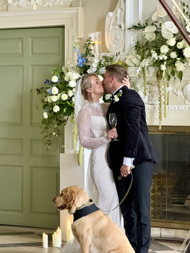Bride and Groom kissing at Crowcombe Court in Somerset