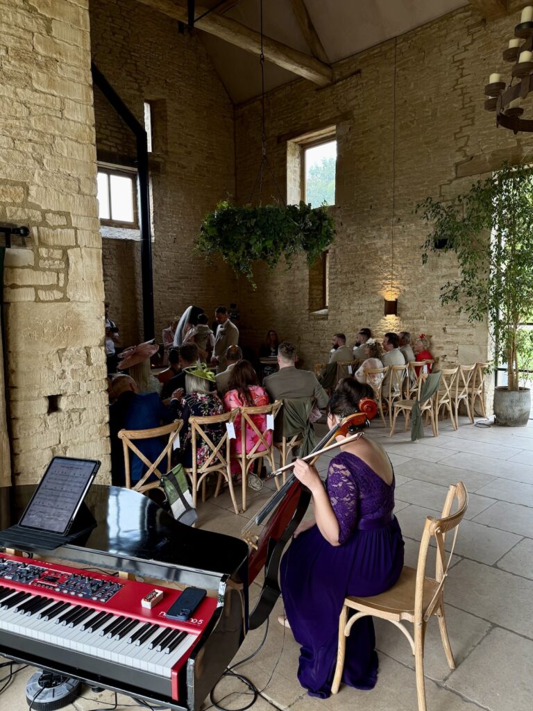 JAM Duo during the wedding ceremony at Old Gore in Cirencester.