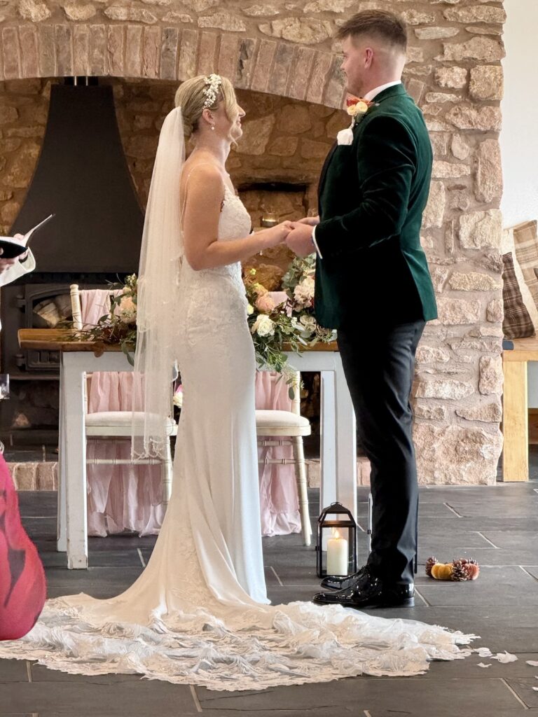 Bride and Groom Holding hands at Quantock Lakes in Somerset