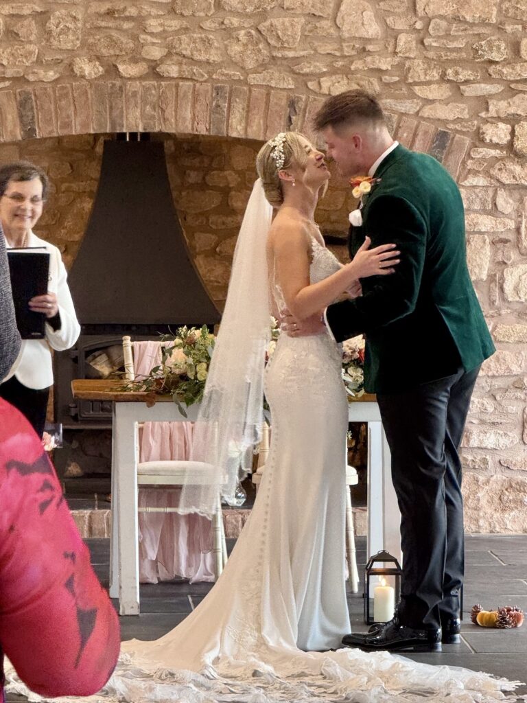 Bride and Groom first kiss at Quantock Lakes in Somerset