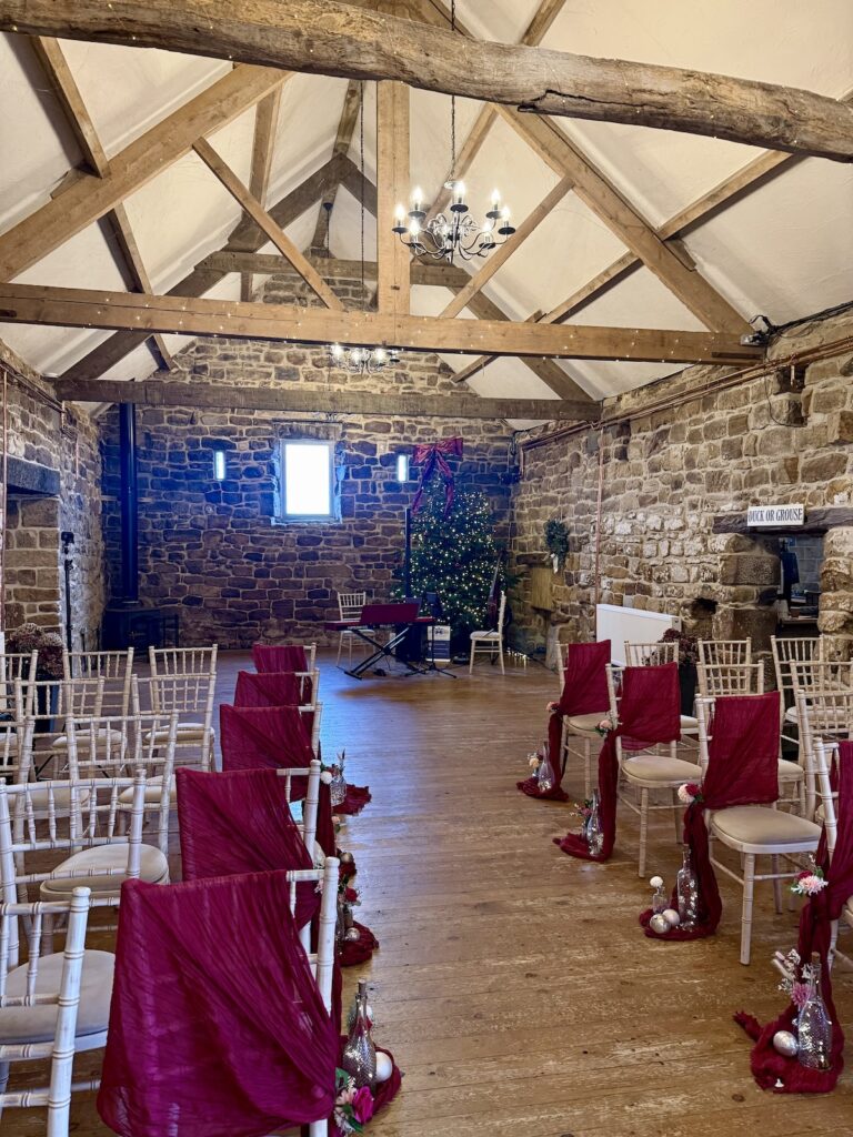 Intimate winter wedding ceremony with live musicians in North Yorkshire

