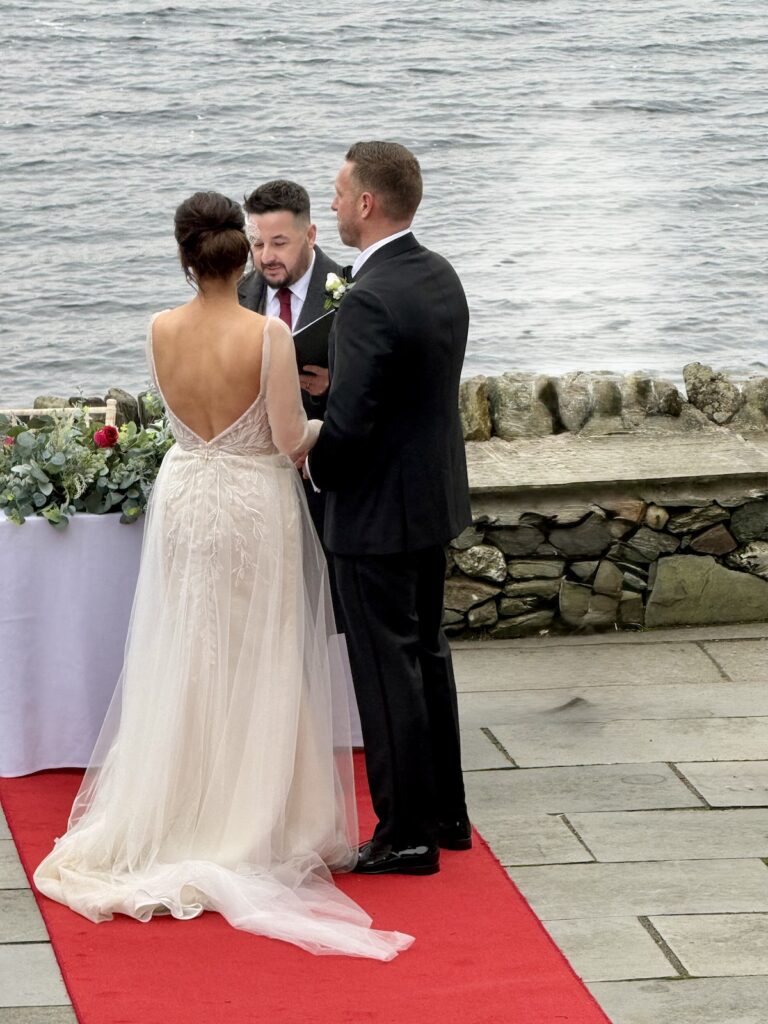Bride arriving to live cello and piano music at winter wedding in Scotland