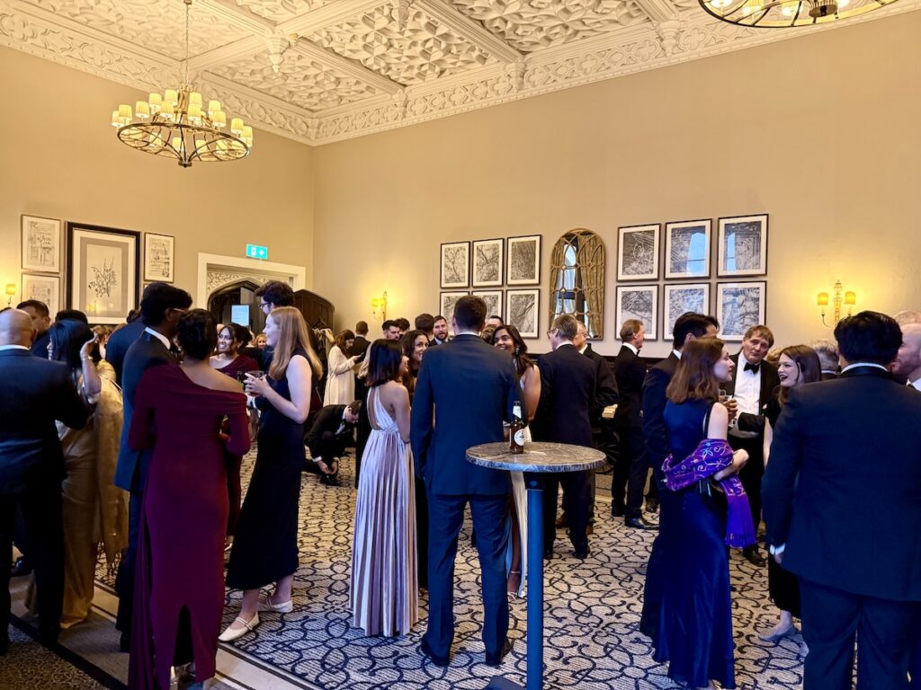 Grand interior of Tortworth Court during winter wedding celebration