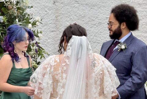 Outdoor Wedding Couple with reading - at Logie Country House in Scotland