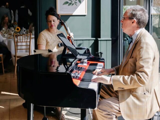 JAM Duo Cello and Piano Duo with Gloss Black Piano Shell