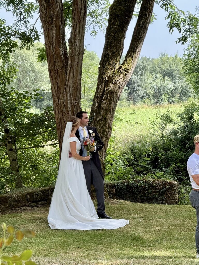 Bride and groom at Château de Chanzé following their destination wedding ceremony.