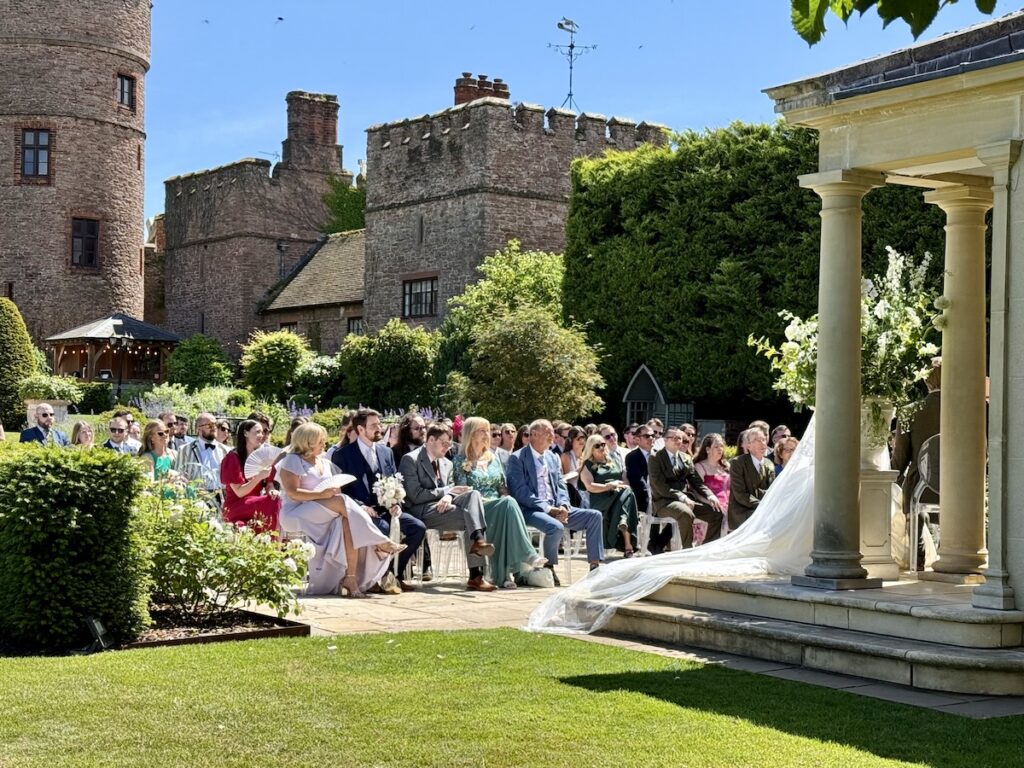 Bride and Groom with an outdoor ceremony at Rowton Castle with daytime wedding music by JAM Duo