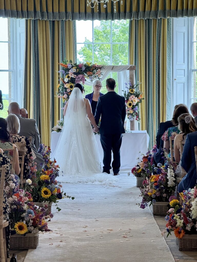 Bride and Groom in the Ballroom for a wedding ceremony at Rudding Park Hotel near Harrogate