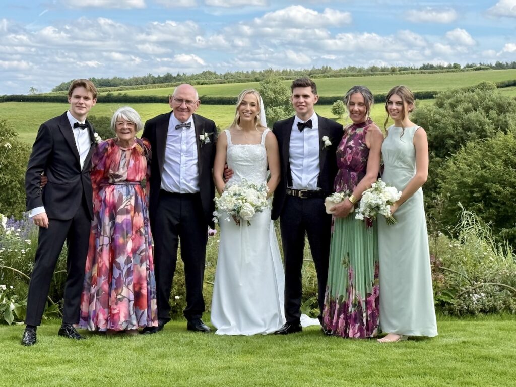 Wedding Family Photo at Kingscote Barn in the Cotswolds with music by JAM Duo Cello and Piano