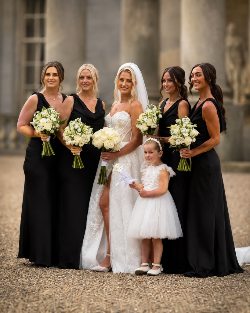 Bride with bridesmaids at Wynyard Hall