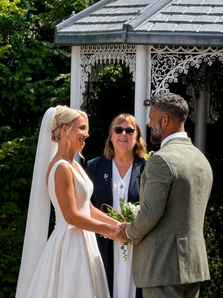 Bride and groom during ceremony with registrar at Bowburn Hall Hotel in Durham