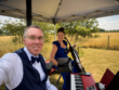 JAM Duo providing music outside under a canopy