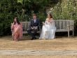 Bride sitting on bench at Bury Manor Barns in Sussex
