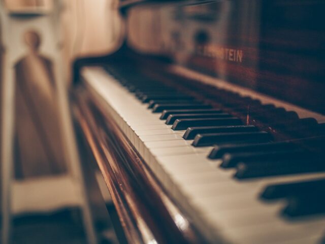 Piano in an elegant interior representing live music for funerals and wakes