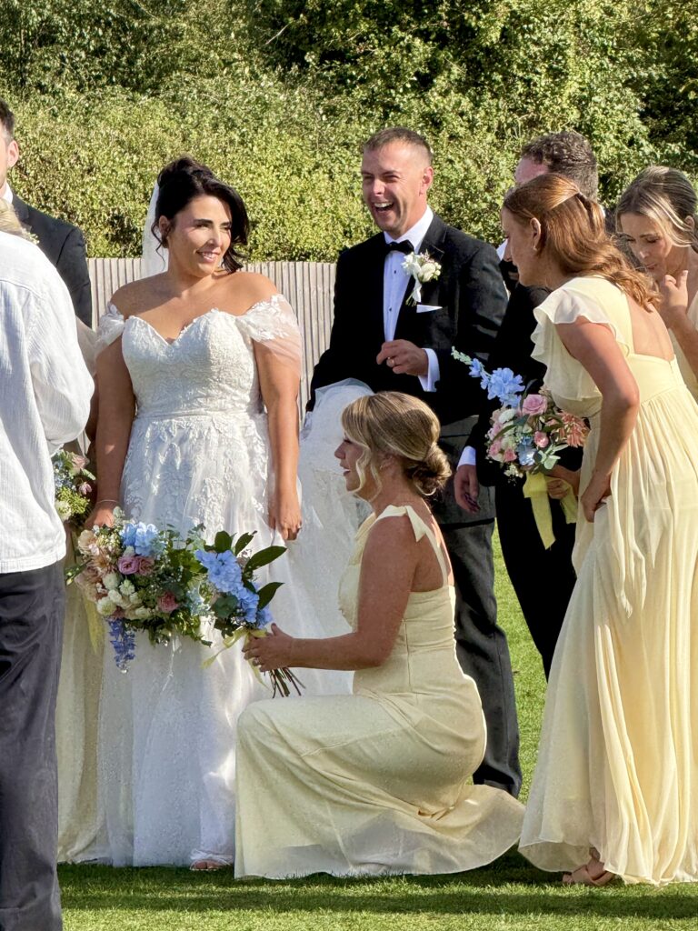 Bride with bridesmaids outside