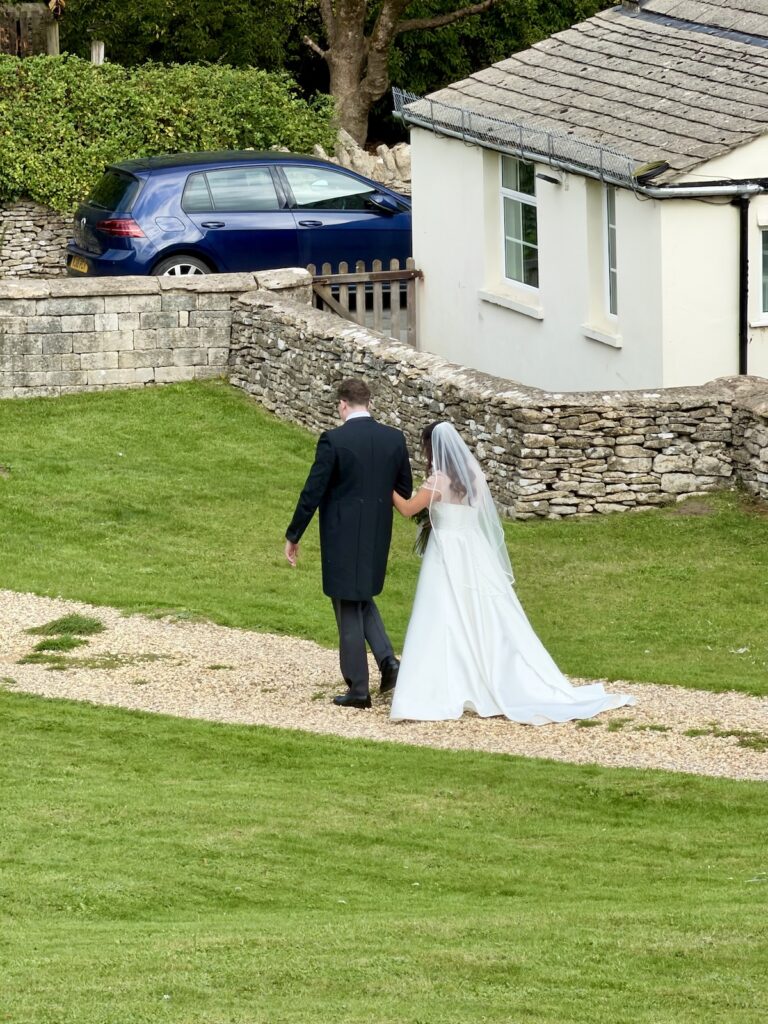 Bride and Groom outside Avening Church