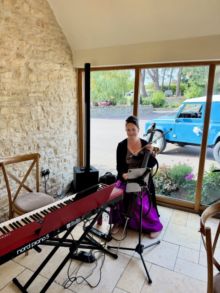 Anne Marie Humphries Wedding Cellistat Kingscote barn in The Cotswolds
