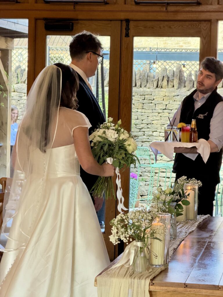 Bride and Groom with JAM Duo Wedding Musicians Cello and Piano at Kingscote Barn in Gloucestershire and The Cotswolds